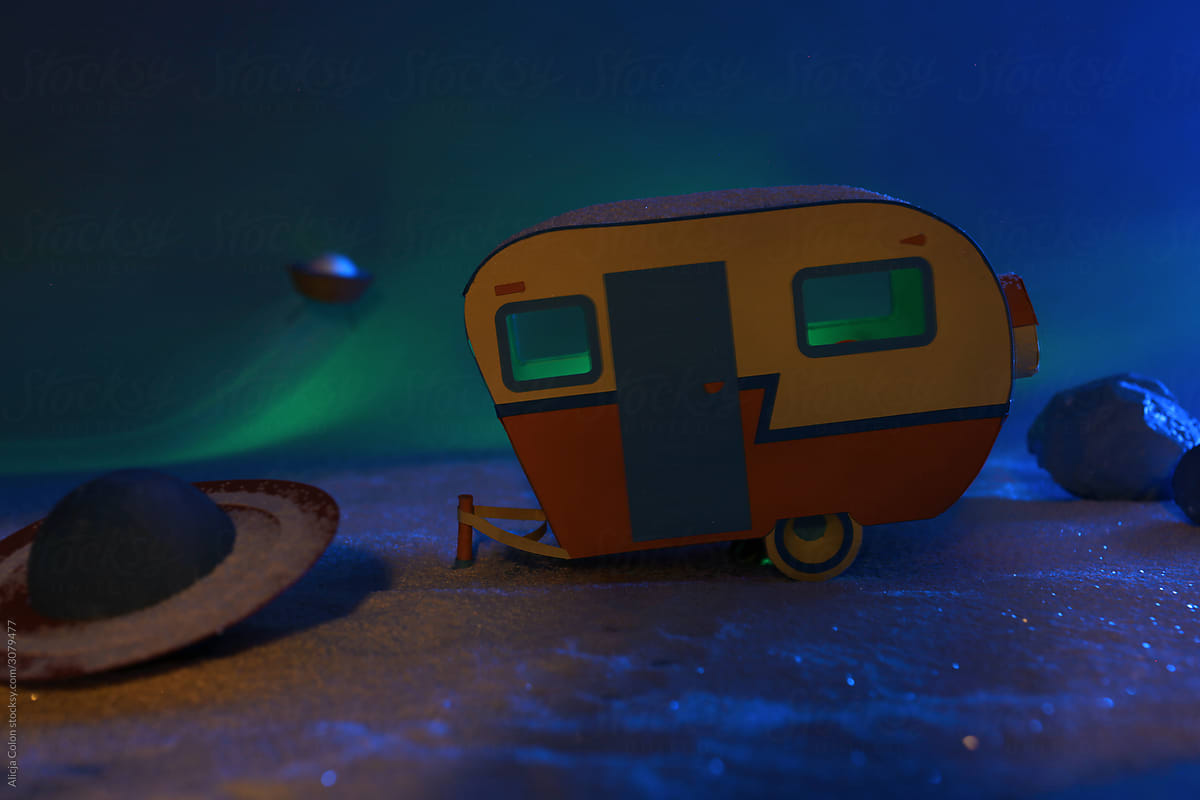 Paper craft camper on a planet