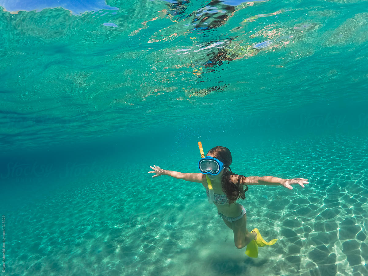 Girl Swimming Underwater By Dejan Ristovski