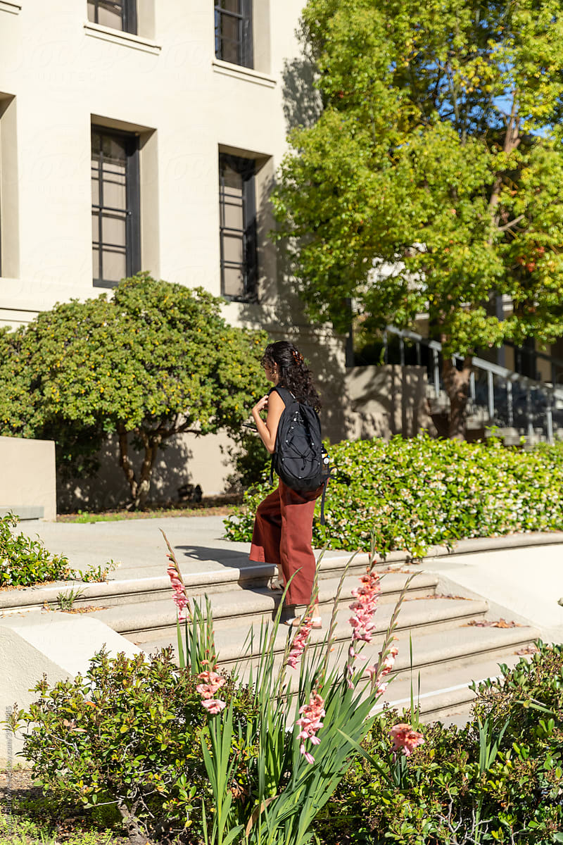 Woman Walks to Academic Building