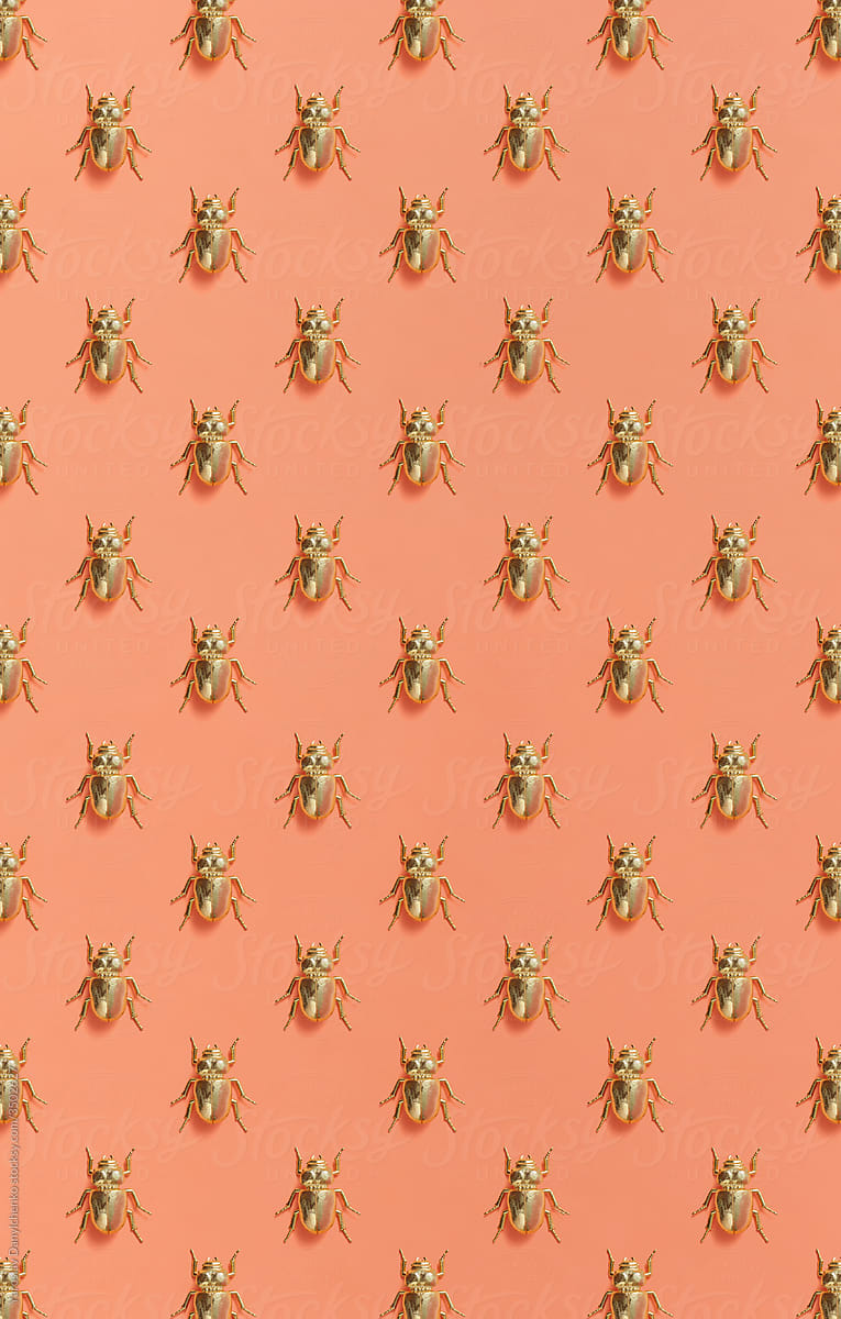Vertical pattern from metal golden scarab beetles.