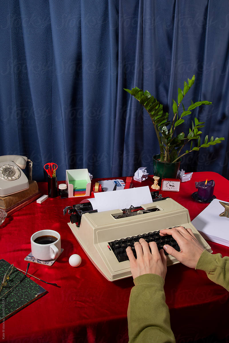 Office worker typing on typewriter / Still life