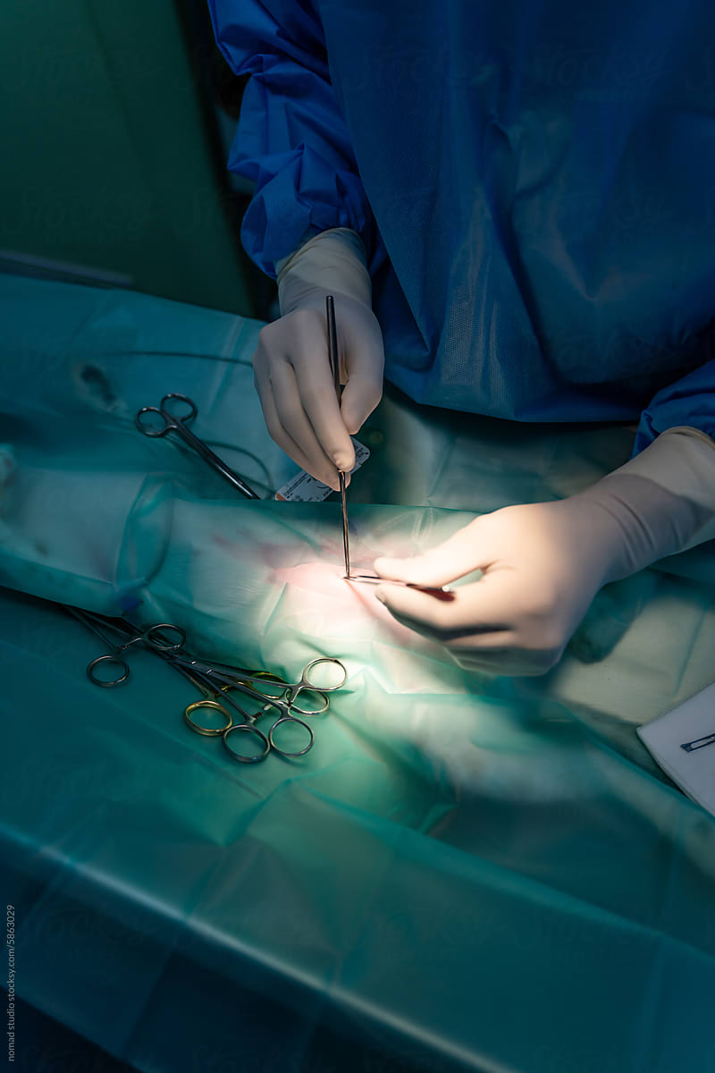 Close up view of surgeon operating.