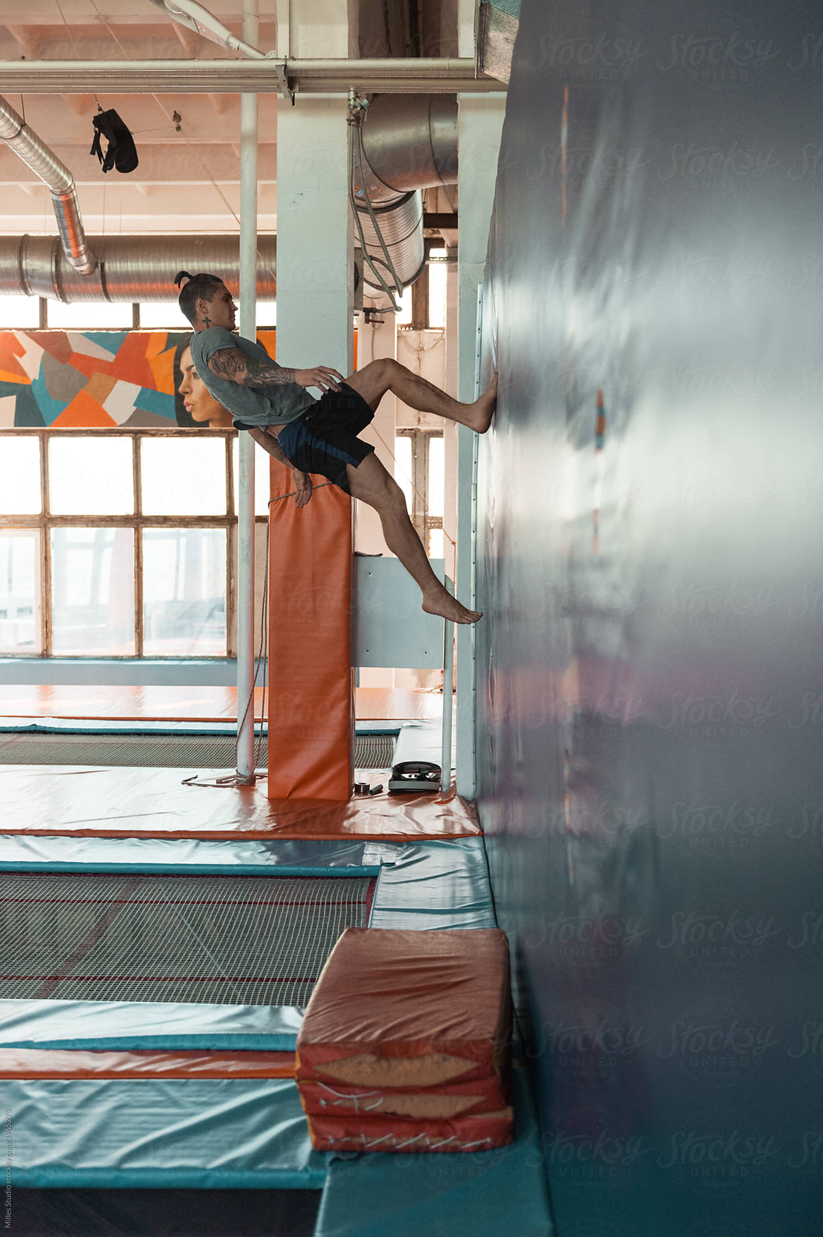 Vruchtbaar Dan Praktisch Sportsman Doing Flip On Tramp Near Wall" by Stocksy Contributor "Milles  Studio" - Stocksy