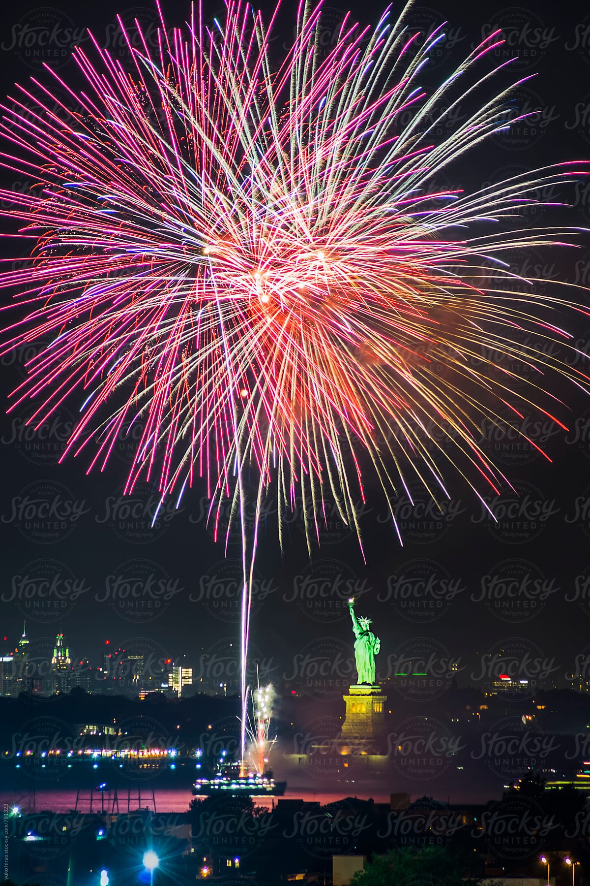 Celebration fireworks with the Statue of Liberty in New York