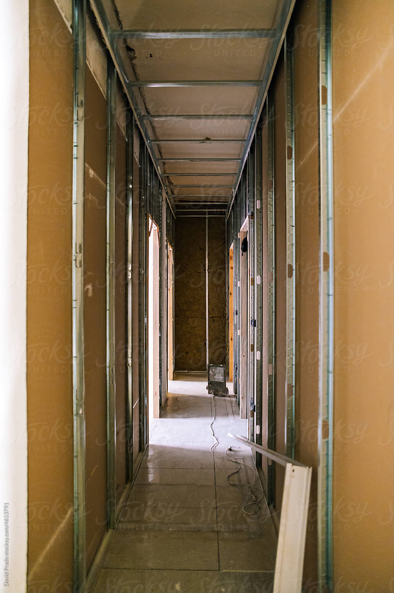 corridor with material under construction in home