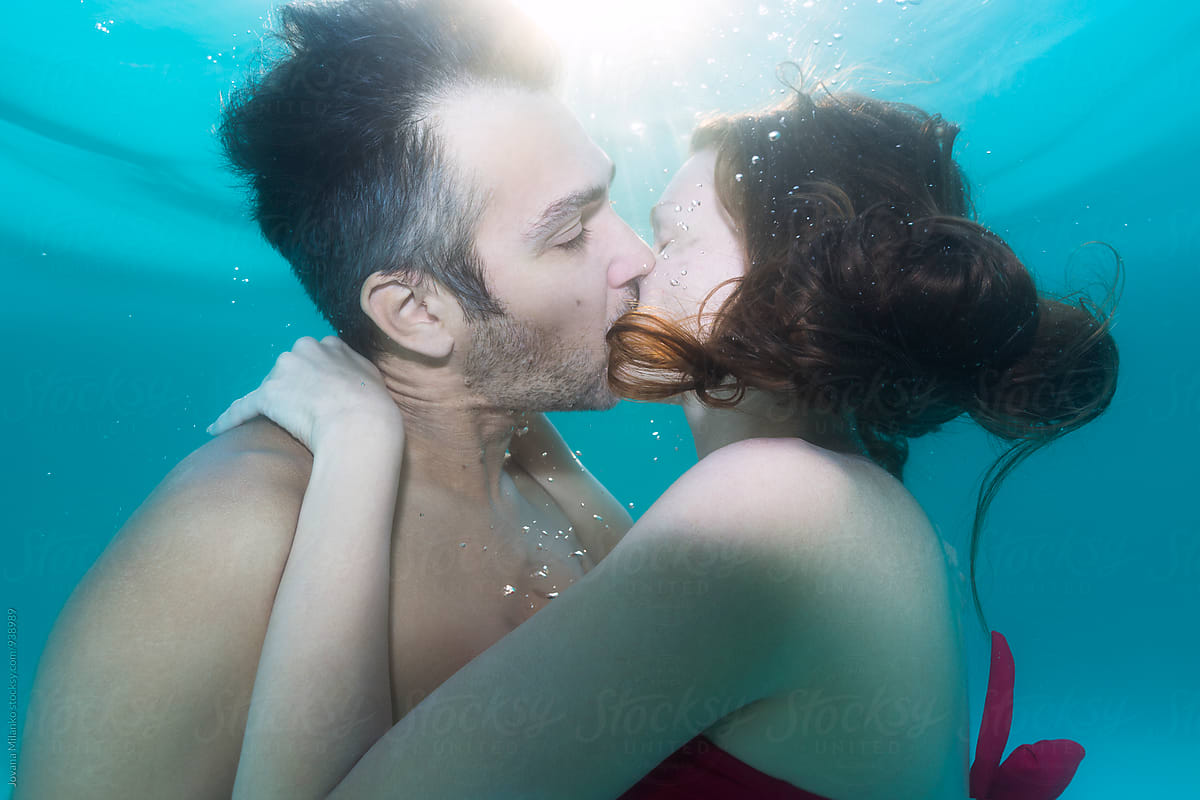 Couple Kissing Underwater By Stocksy Contributor Jovana Milanko