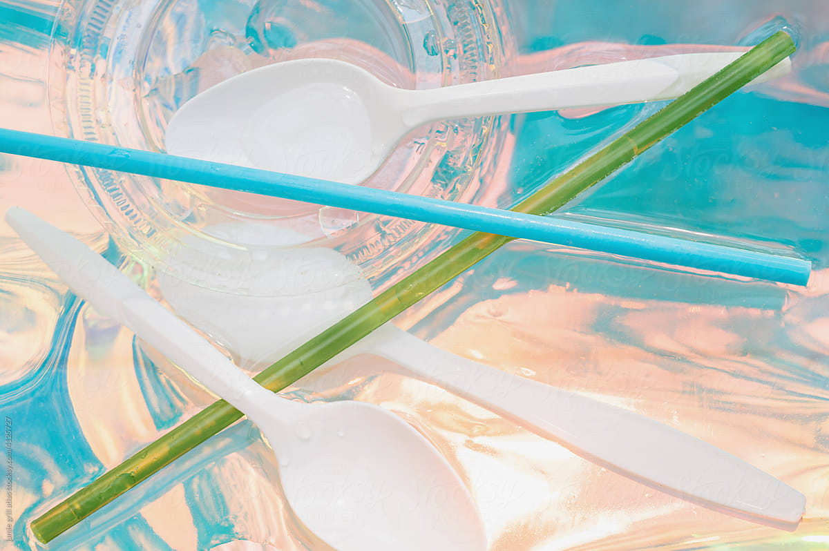 Plastic Spoons and Straws in Water