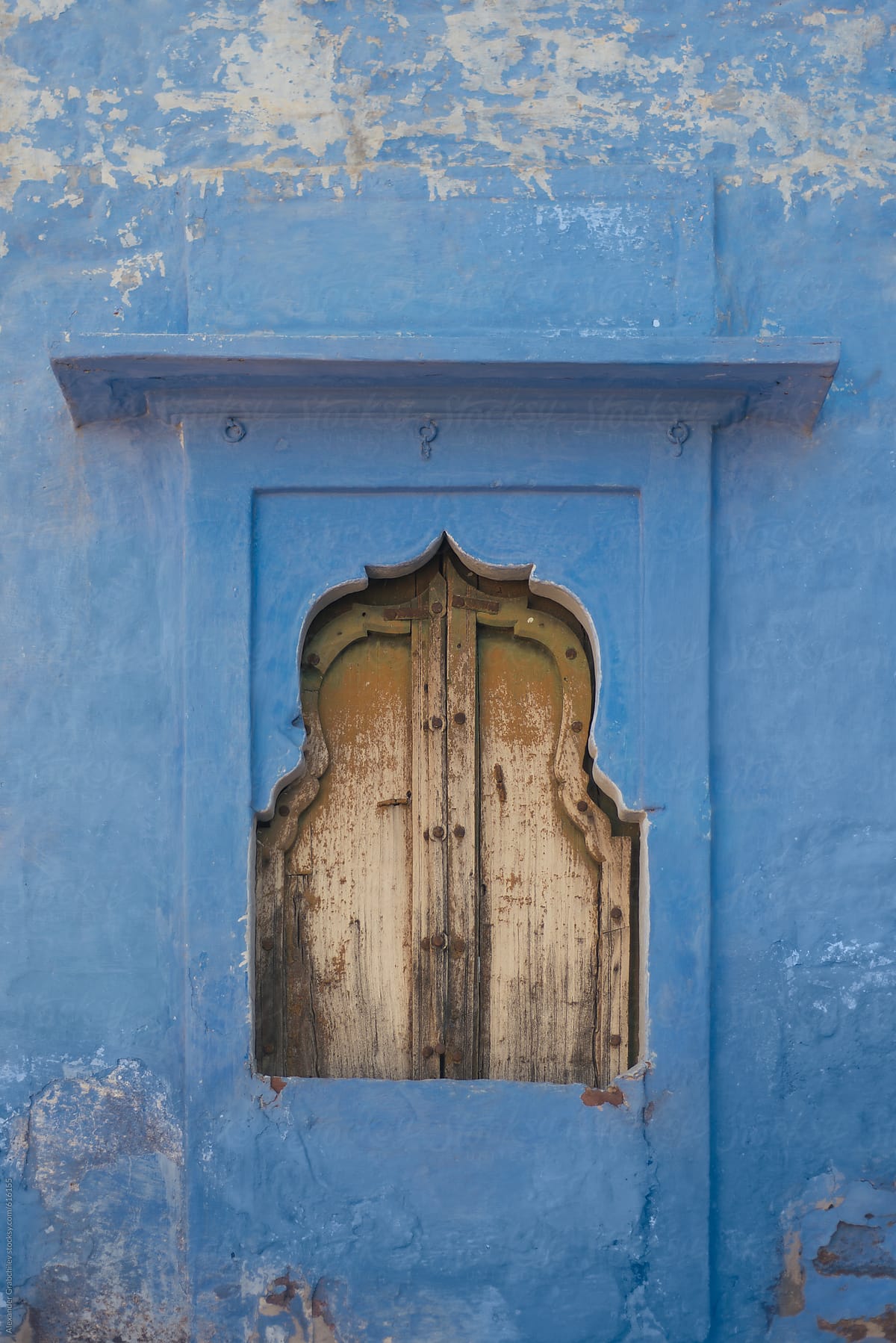 Ornate Indian Window In A Blue City