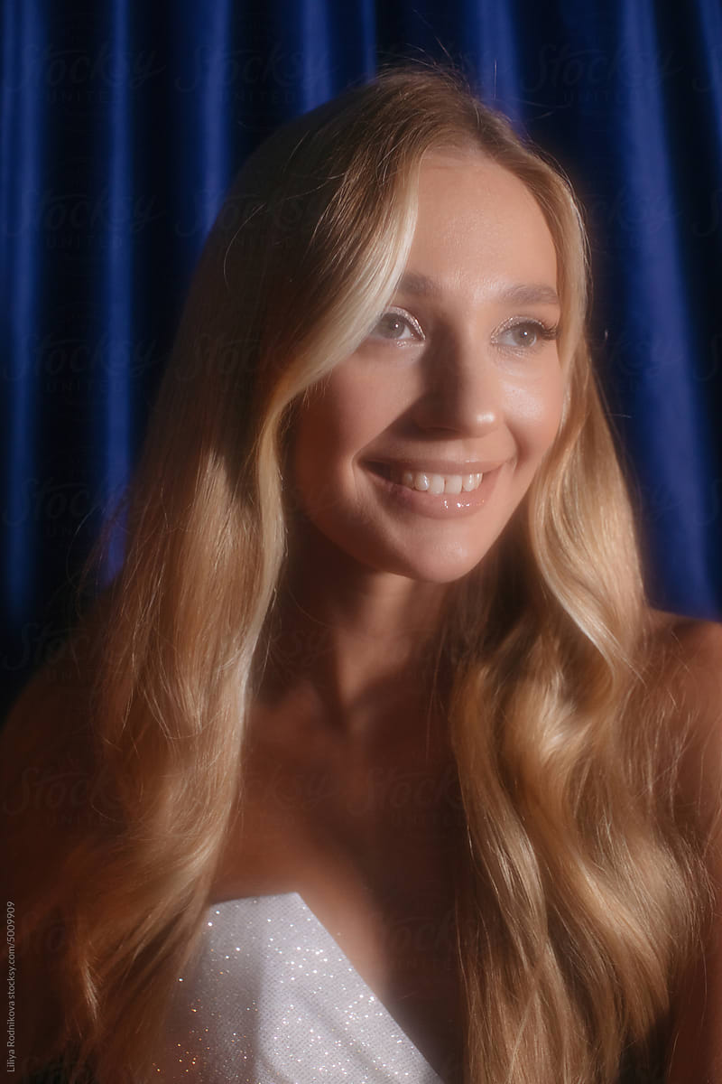 Soft focus portrait of smiling blond woman