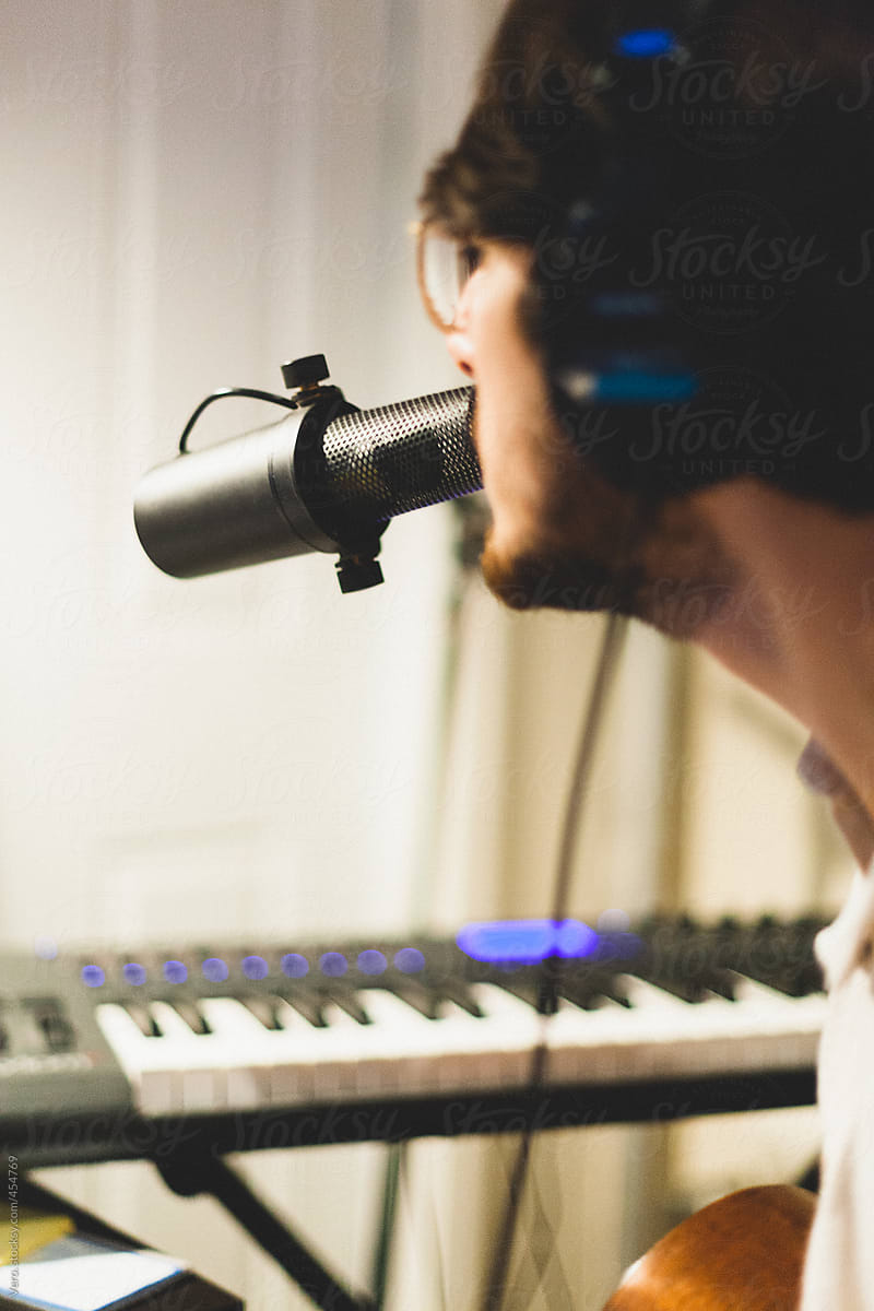 Musician recording in his studio