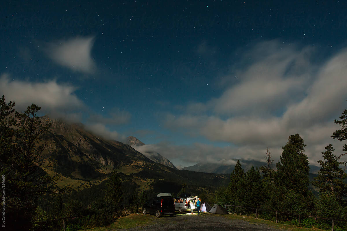 Camping cars under the starry sky in the mountains