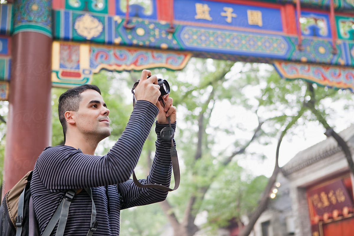 Tourist Taking Photos with Digital Camera on Holiday in Beijing, China