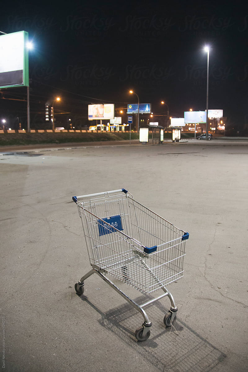 Shopping cart on empty market parking