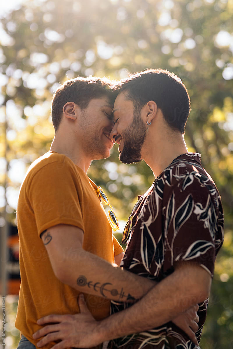 Gay Male Couple Kissing By Stocksy Contributor Santi Nuñez Stocksy
