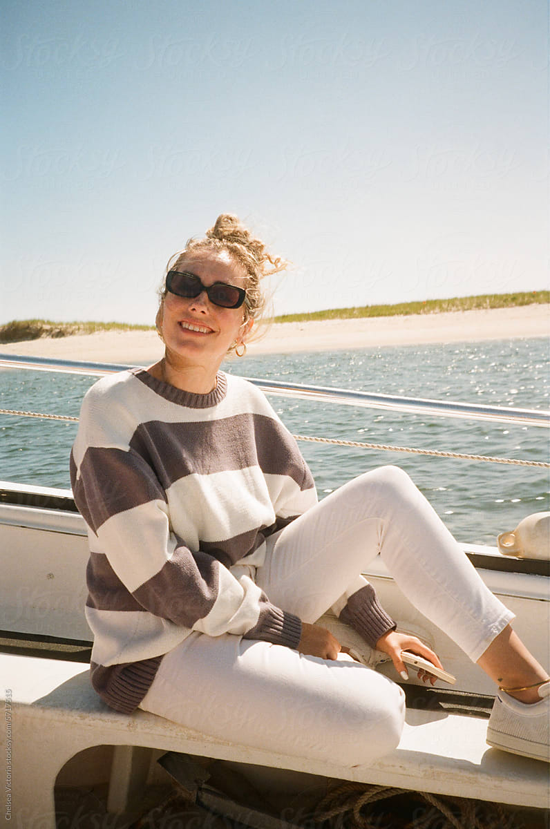 woman smiling on a boat