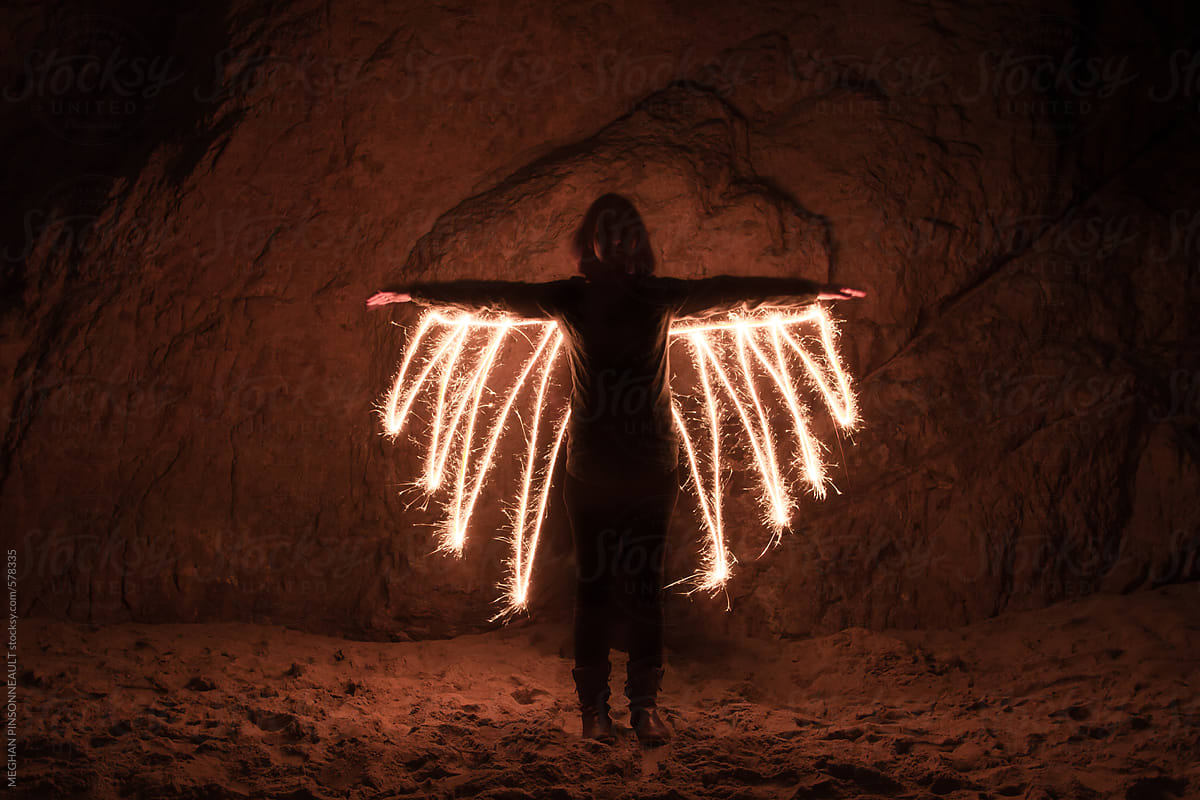 Light Painting of Wings with Female Silhouette
