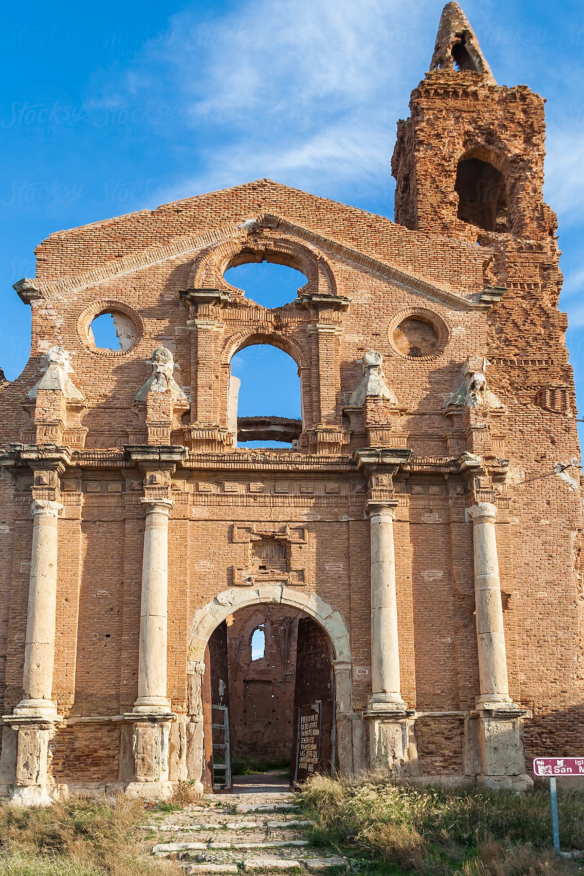 Facade and bell tower of church destroyed by artillery fire