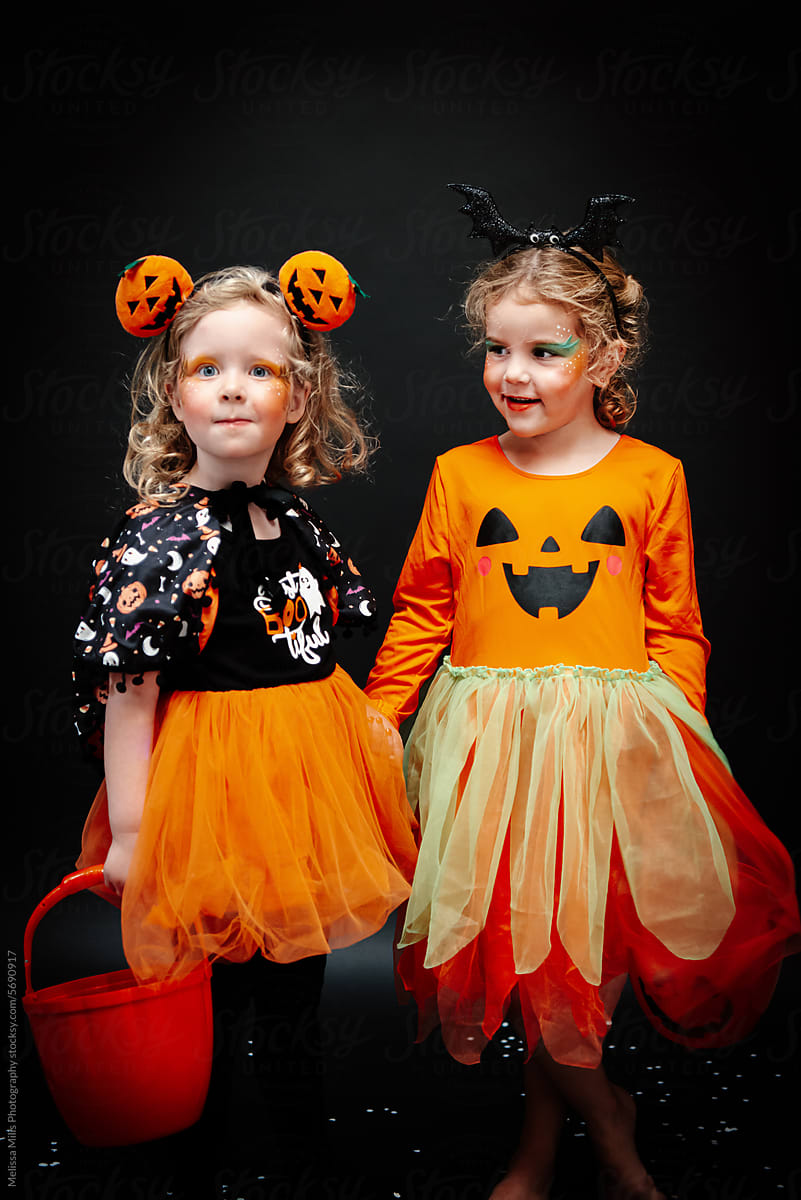 Portrait of 2 girls in Halloween costume