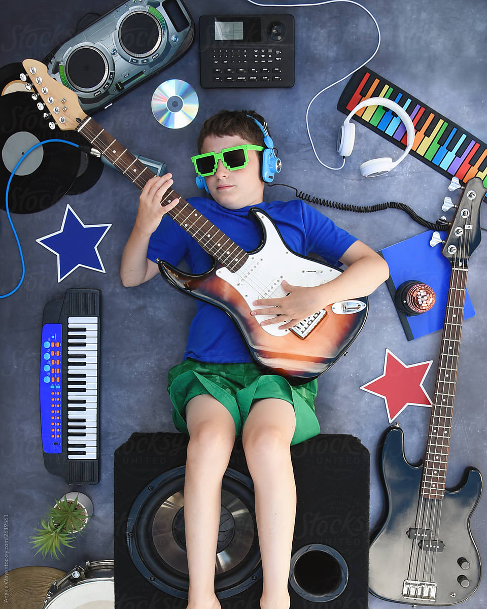 Rock Star Boy Playing Musical Instrument Guitar