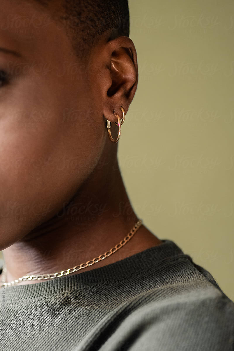 Black Woman Ear and Earring Detail