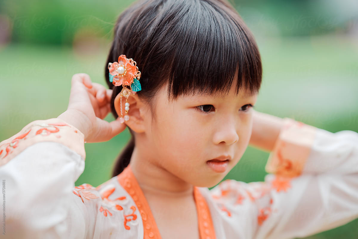 Chinese little girl wearing traditional clothes
