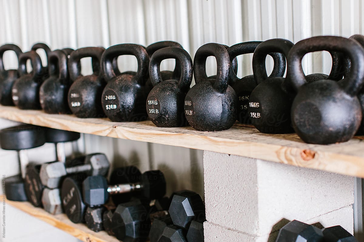Heavy kettlebells weights in a workout gym