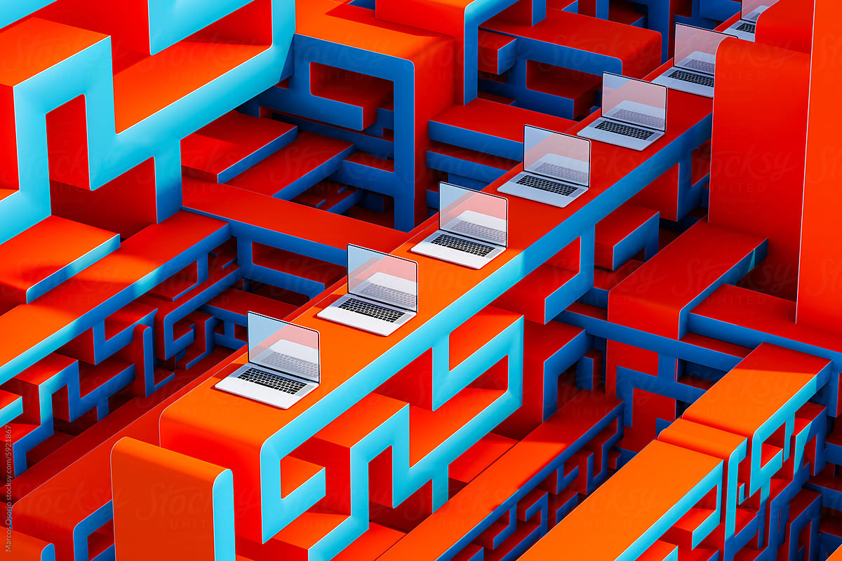 Laptops on Maze Structures Against Blue Backdrop