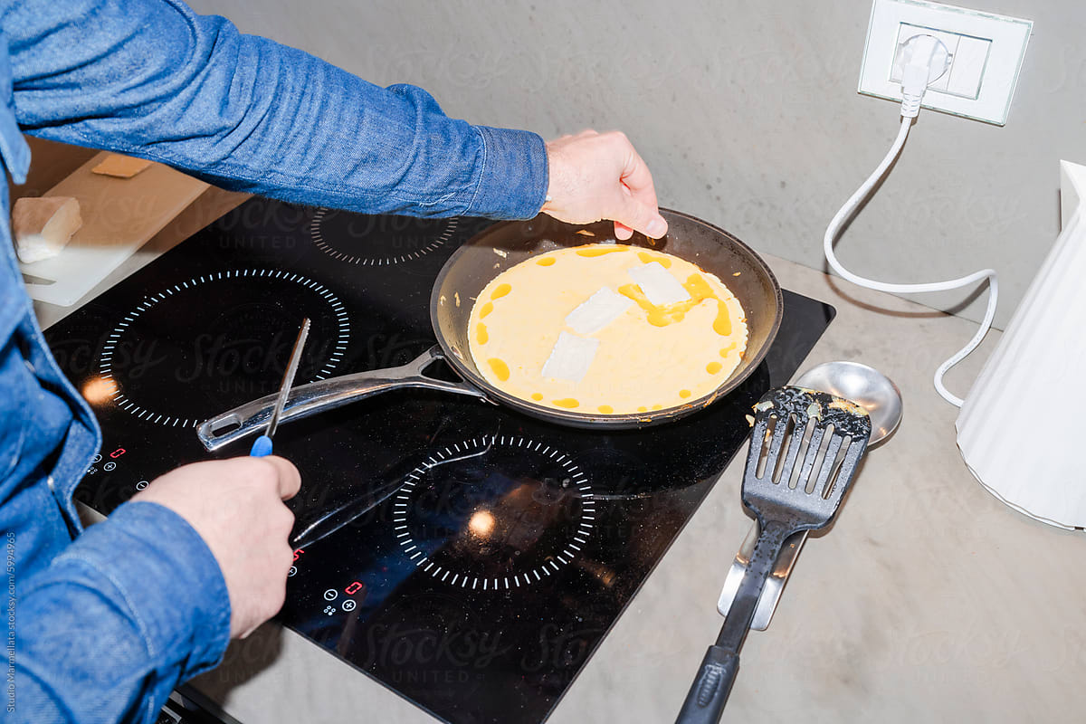 Making Omelette in Modern Kitchen