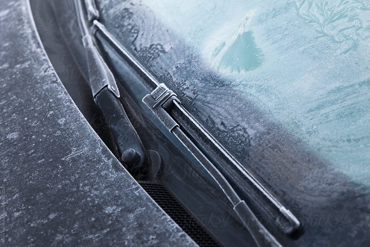 Ice on a frozen car window in winter