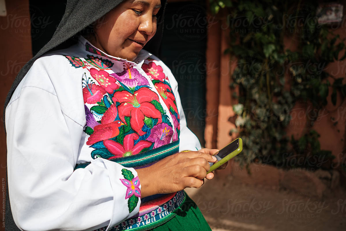 indigenous woman Using her phone