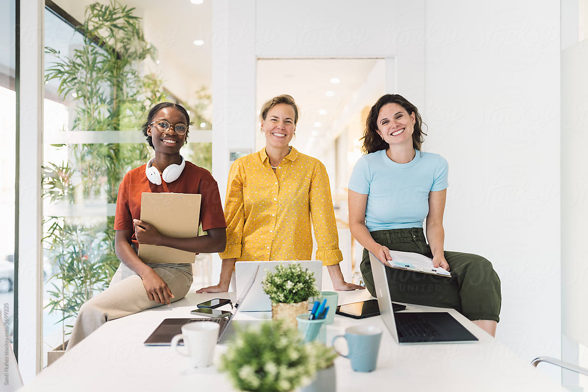 Happy Multiethnic Teamwork In A Coworking Space