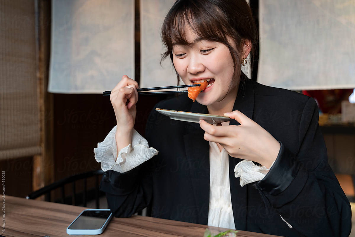 woman eating Japanese food