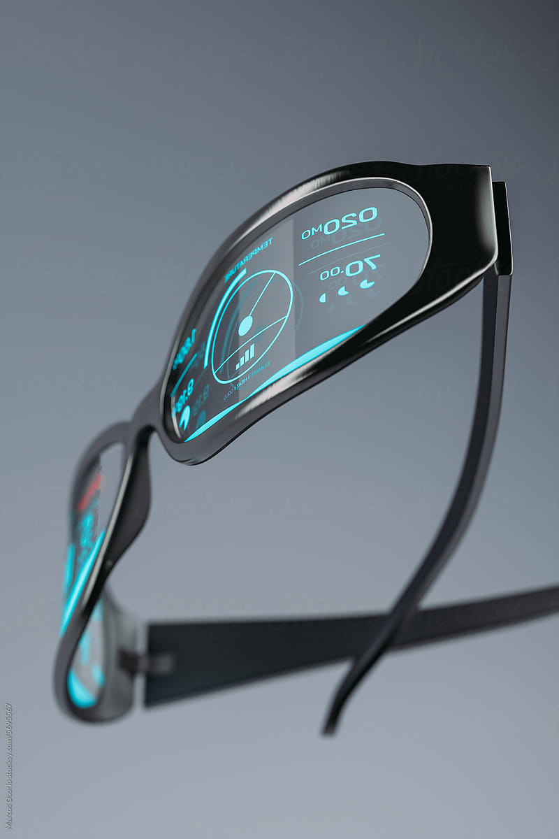 A futuristic glasses device with a digital display on