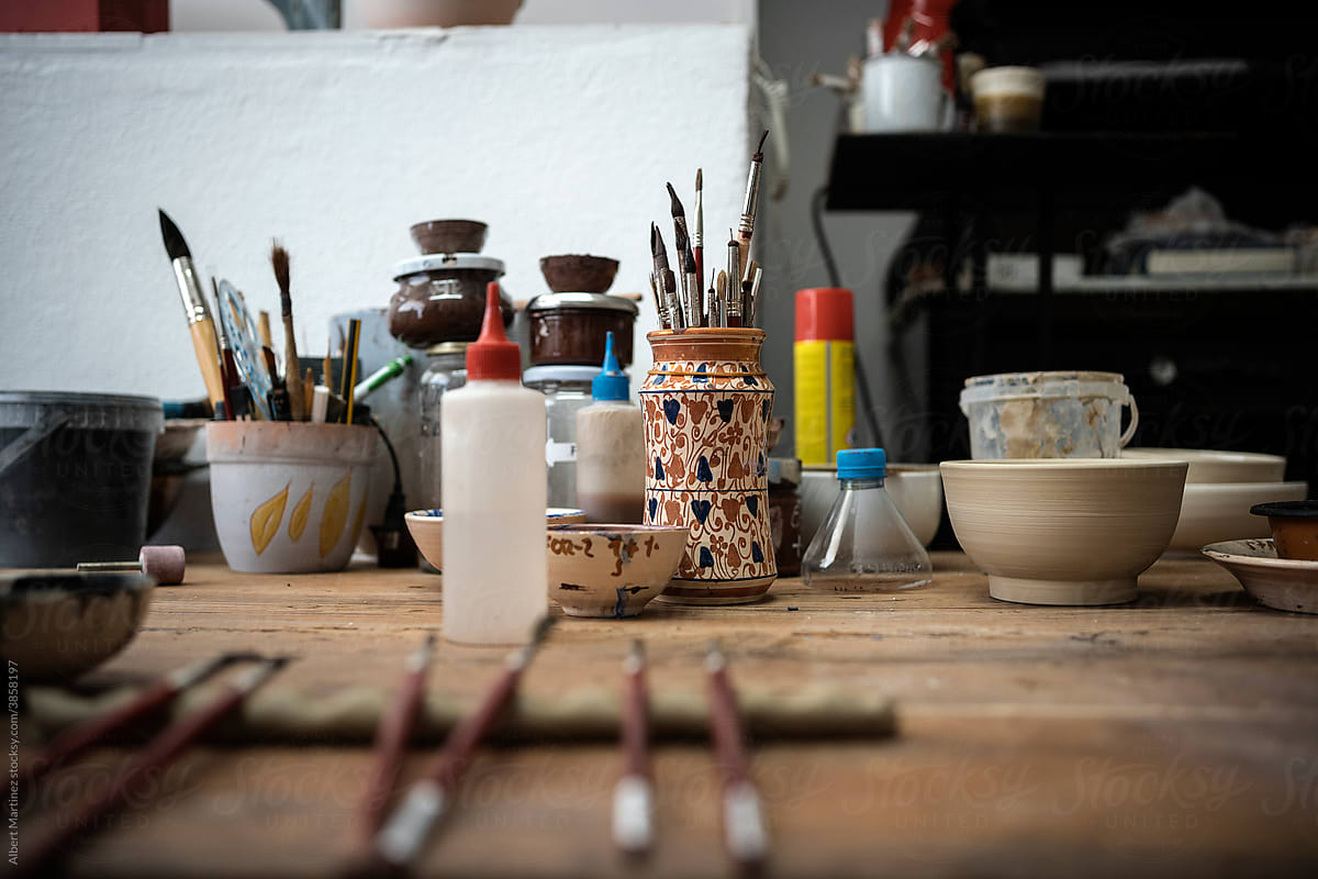 Table of a ceramics workshop with tools to work with.