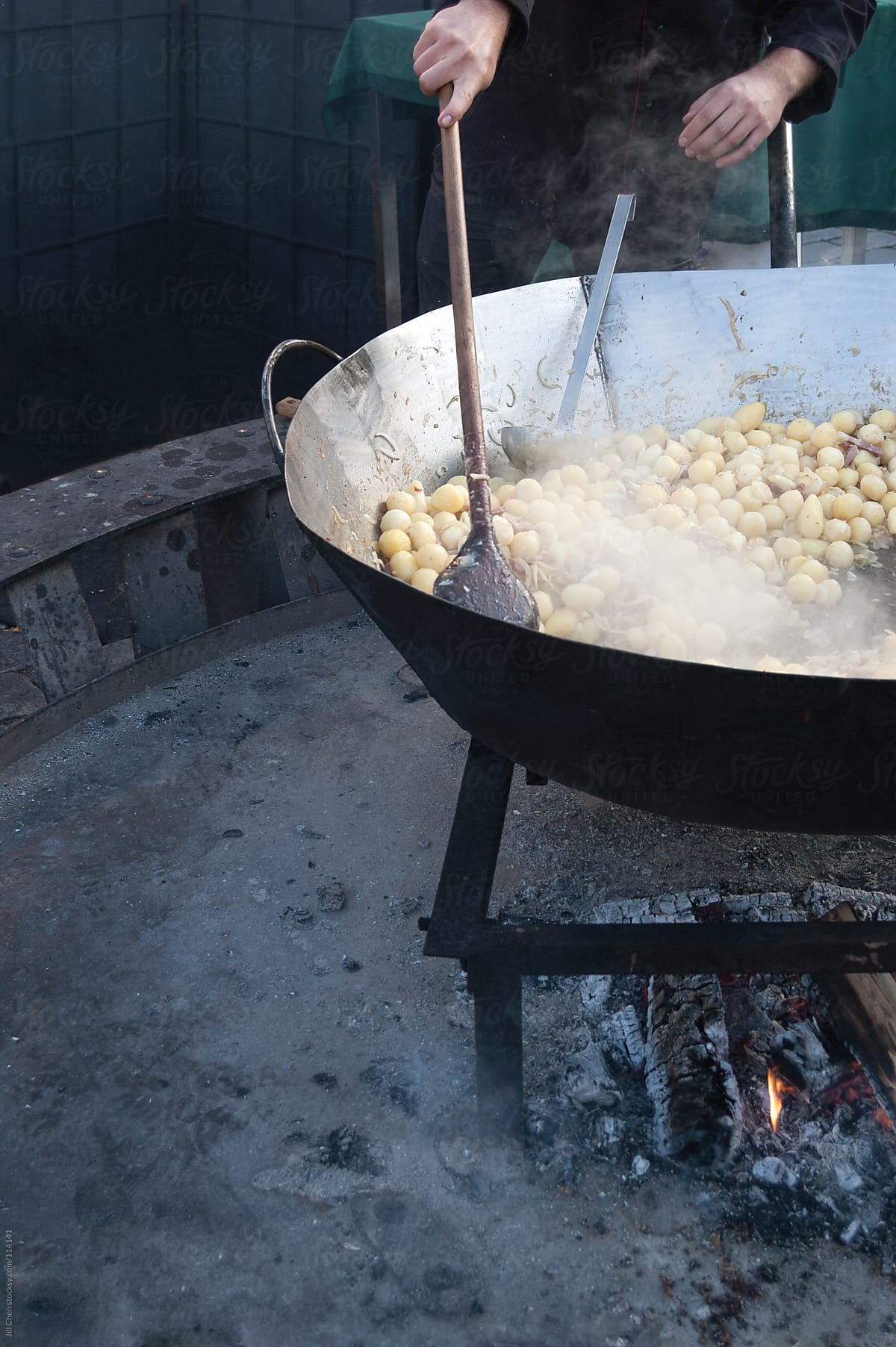 Cooking potatoes at the market