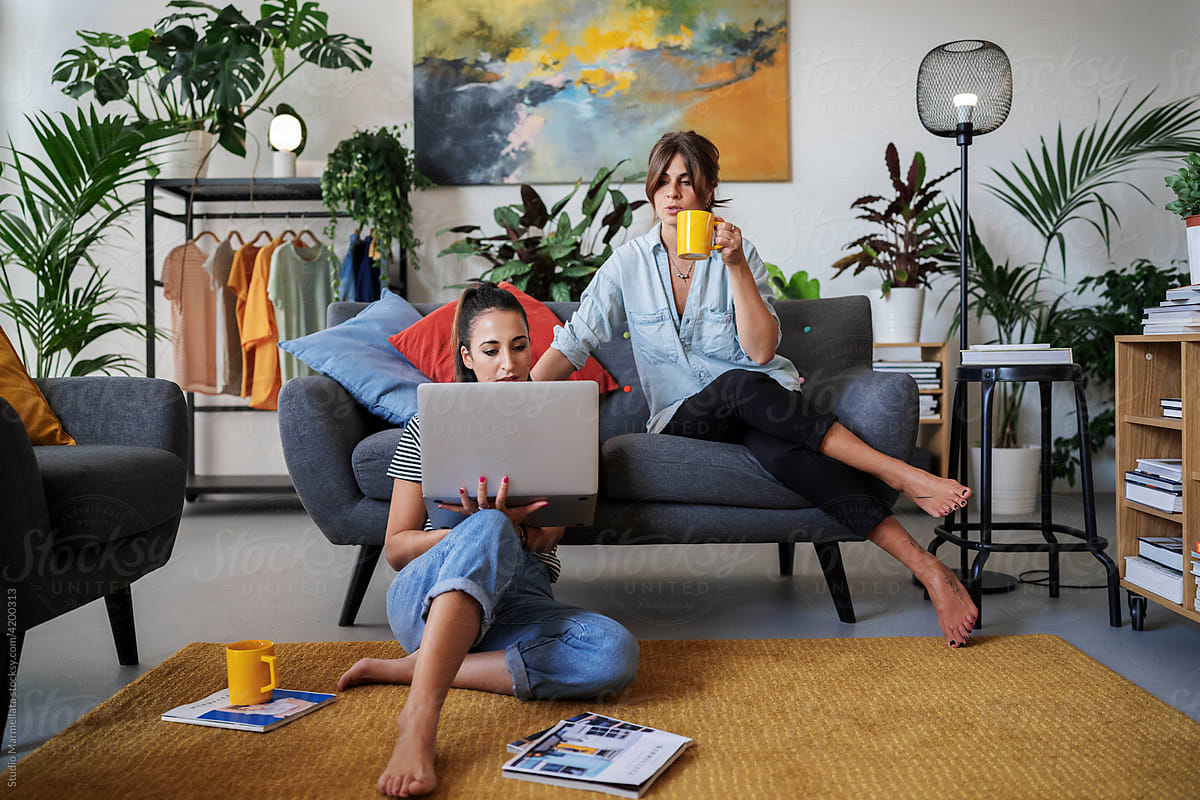 Diverse freelancers using laptop together