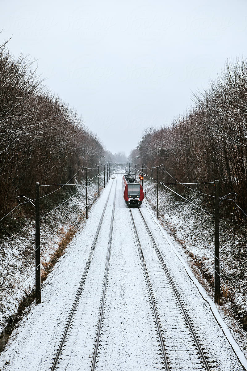 View of a  train in the snow in Copenhagen, Denmark.