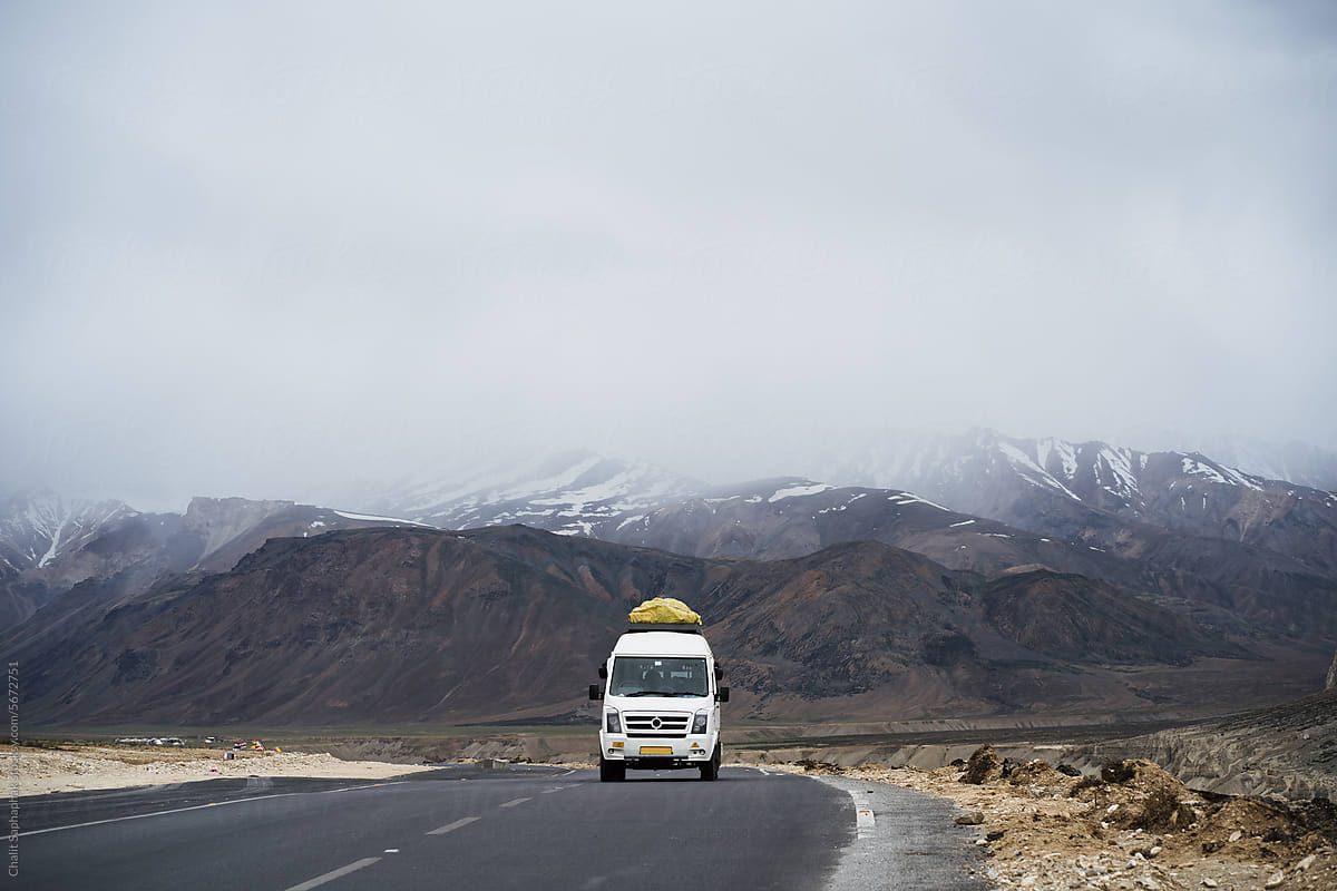 Van on the fog road in Ladakh.