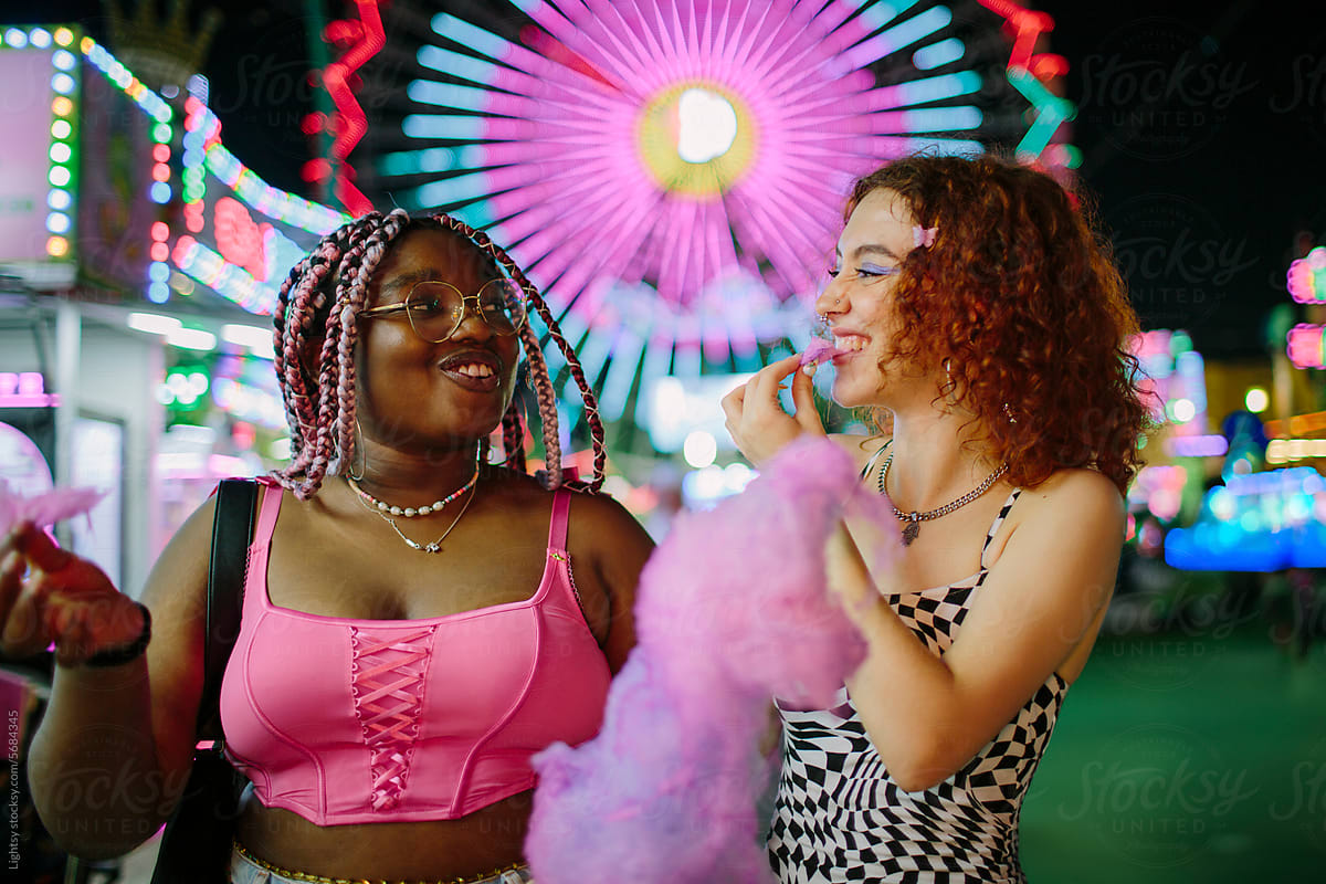 Two women having fun at a fair