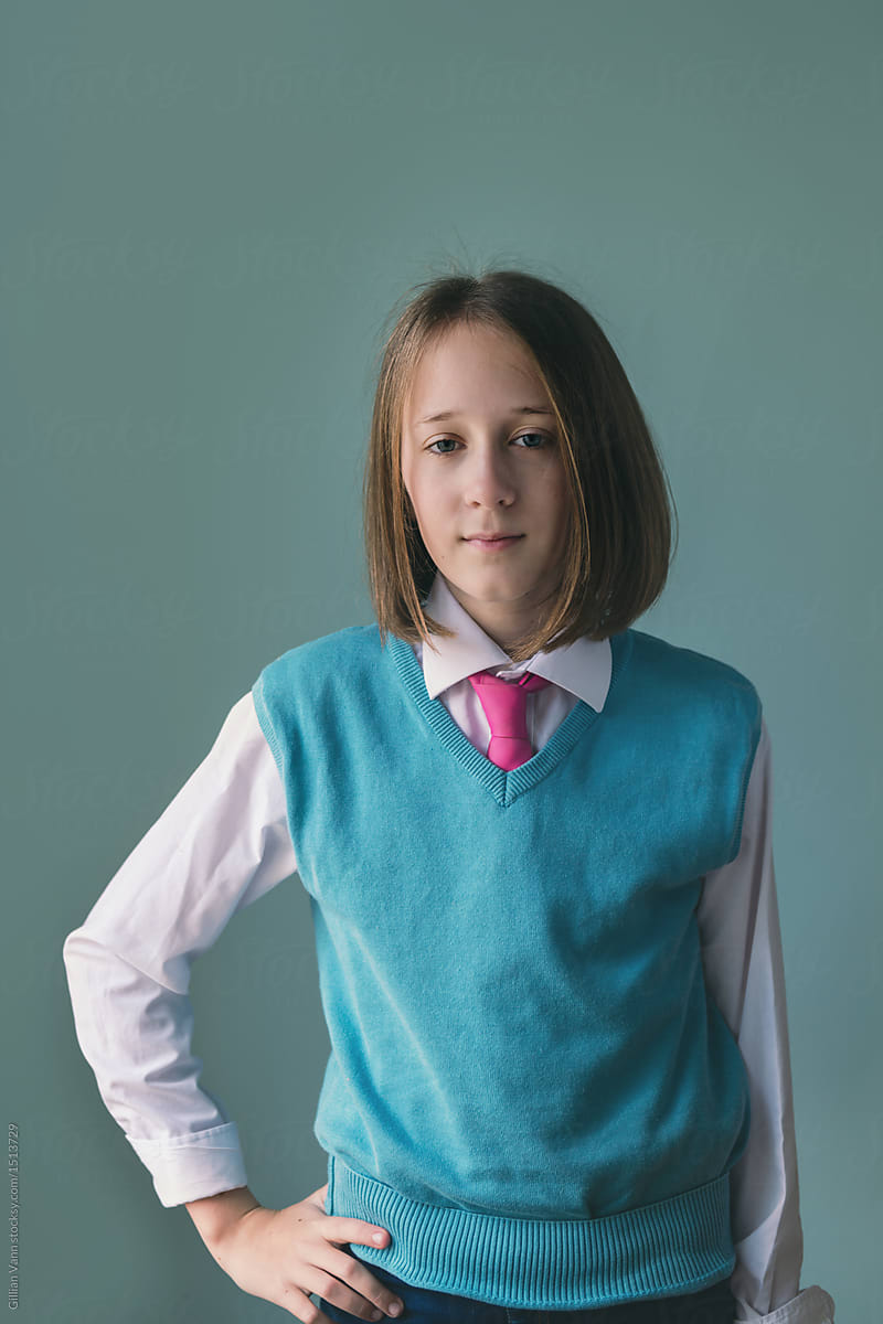 Gender Neutral Tween Girl In Sweater Shirt And Tie Del Colaborador 