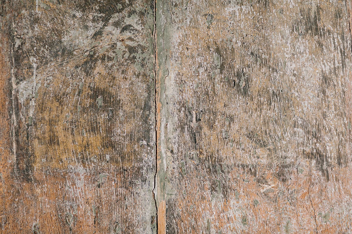 Old cracked stained grungy wood texture
