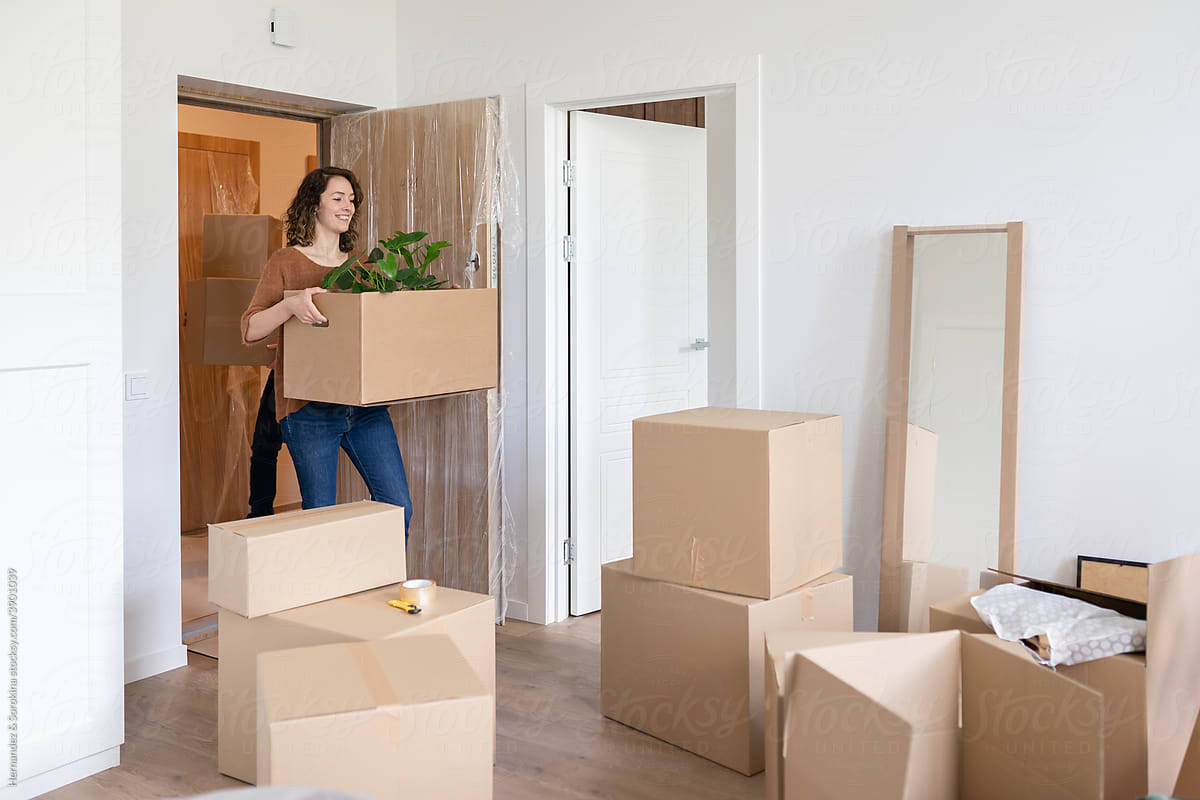 Couple Moving In To New Apartment