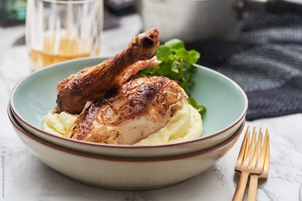 Roast chicken with mashed potato.