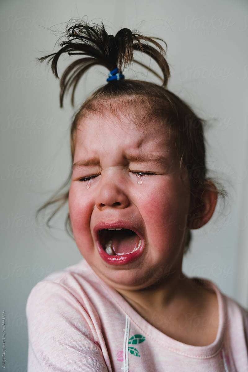Crying Toddler Girl with Topknot