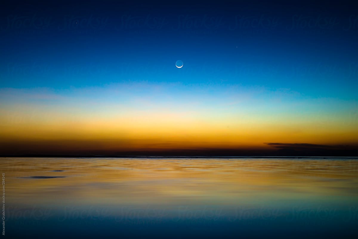 New Moon Rise over Evening Sea