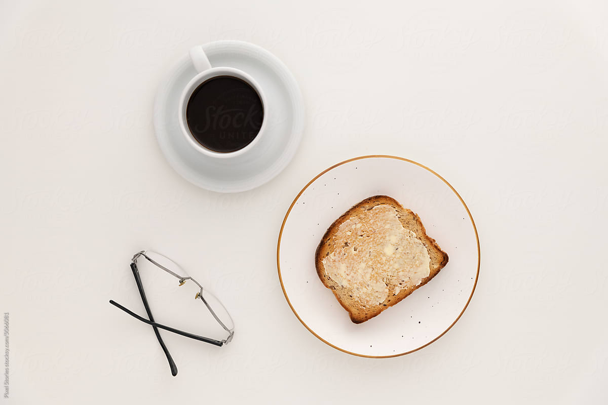 Food: simple breakfast with toasts, butter and coffee