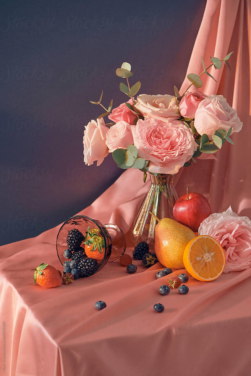 still life with garden flowers and fruits