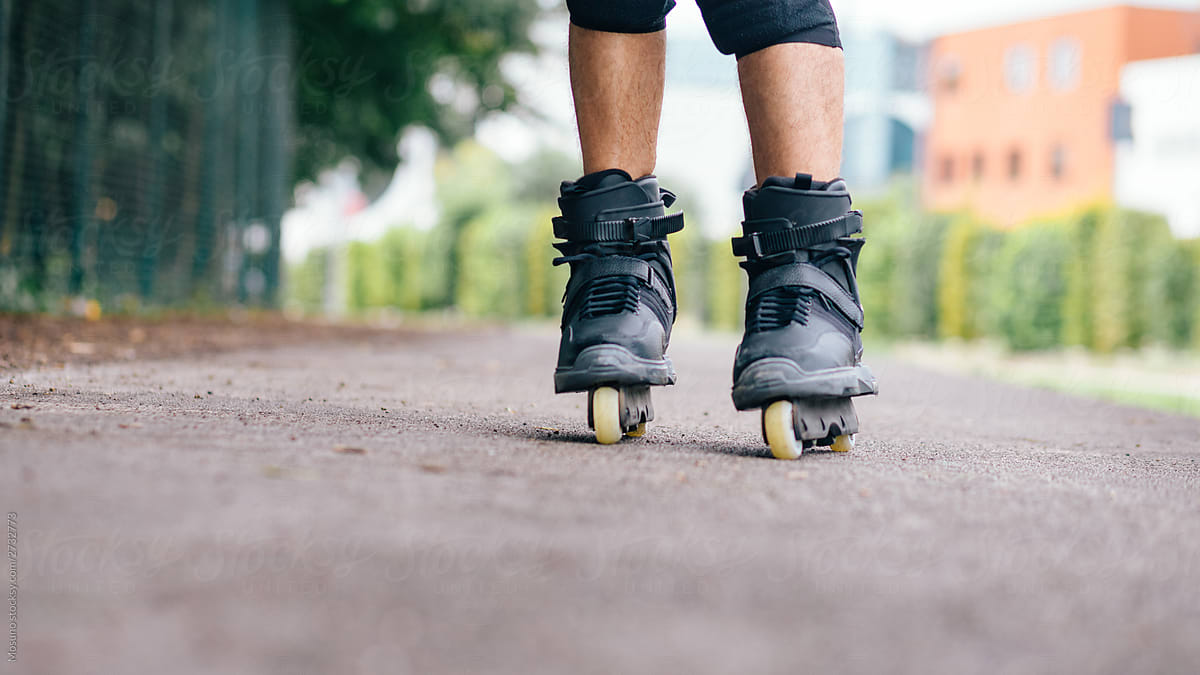Active young man on roller skates
