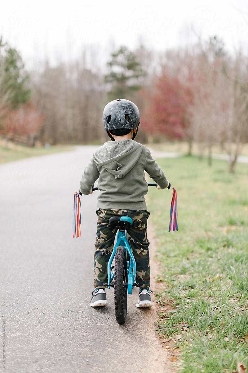 Boy learns to ride bike