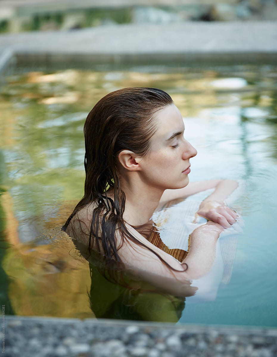 Woman Relaxing In Water At Japanese Spa And Hot Springs Del